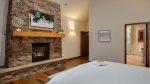 Primary suite features fireplace and ensuite bathroom